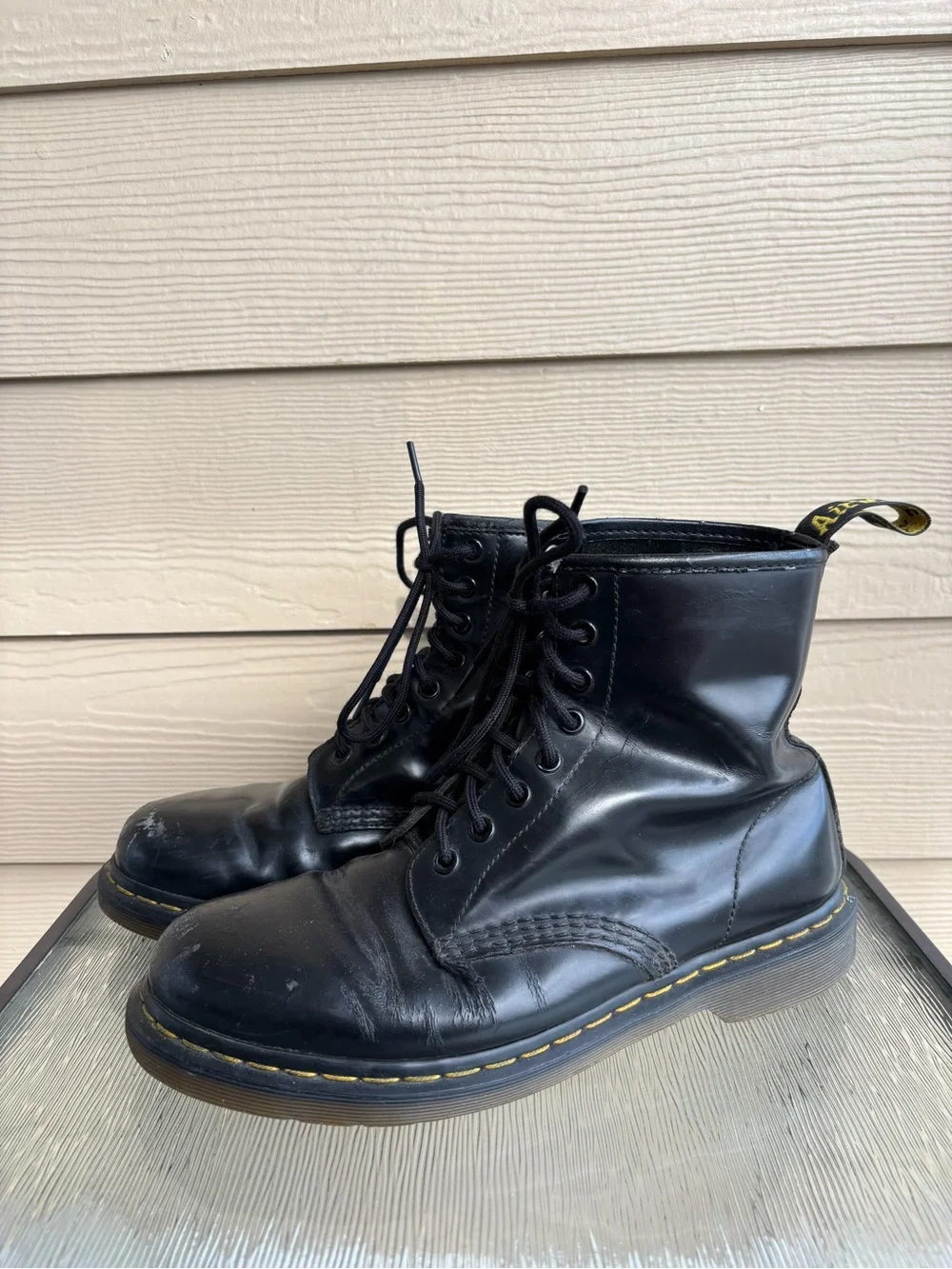 Dr. Martens Black Leather 8-Eye Combat Boots with Yellow Welt Stitching